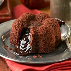 A chocolate lava cake on a plate.