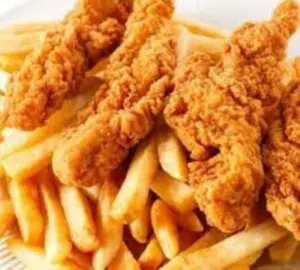 Crispy chicken tenders and french fries.